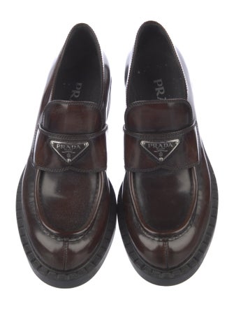 Prada Enameled Metal Triangle Patent Leather Loafers