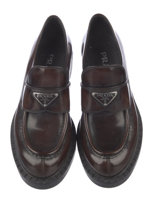 Prada Enameled Metal Triangle Patent Leather Loafers