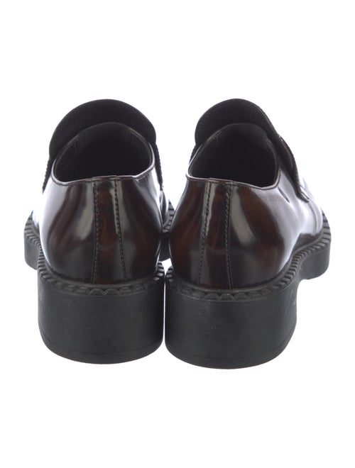 Prada Enameled Metal Triangle Patent Leather Loafers