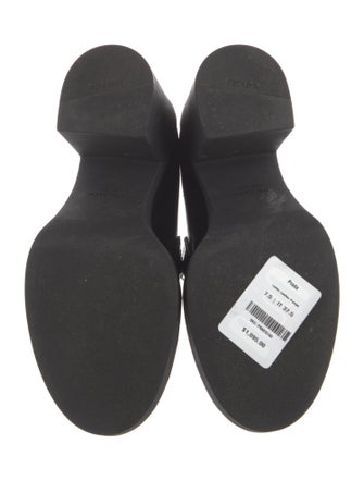 Prada Enameled Metal Triangle Patent Leather Pumps