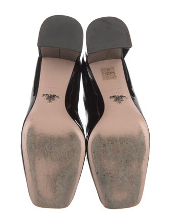 Prada Enameled Metal Triangle Patent Leather Pumps
