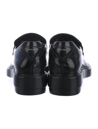Prada Enameled Metal Triangle Leather Loafers