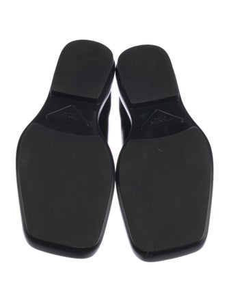 Prada Enameled Metal Triangle Leather Loafers