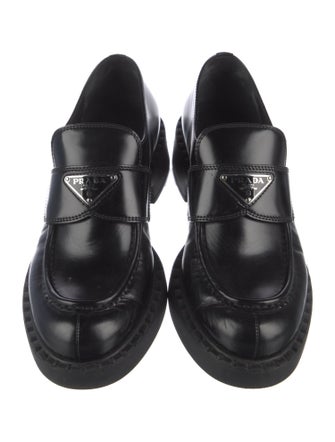 Prada Enameled Metal Triangle Leather Loafers