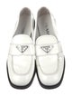 Prada Enameled Metal Triangle Patent Leather Loafers