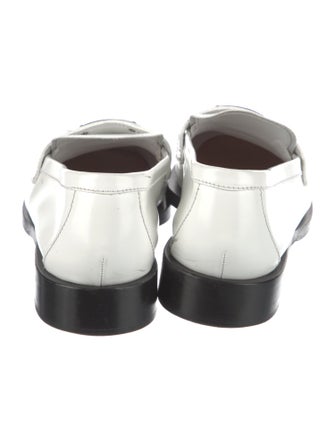 Prada Enameled Metal Triangle Patent Leather Loafers