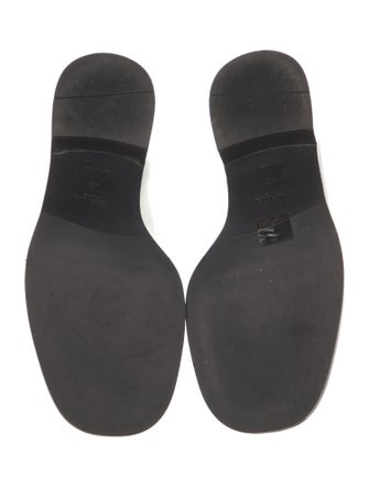 Prada Enameled Metal Triangle Patent Leather Loafers