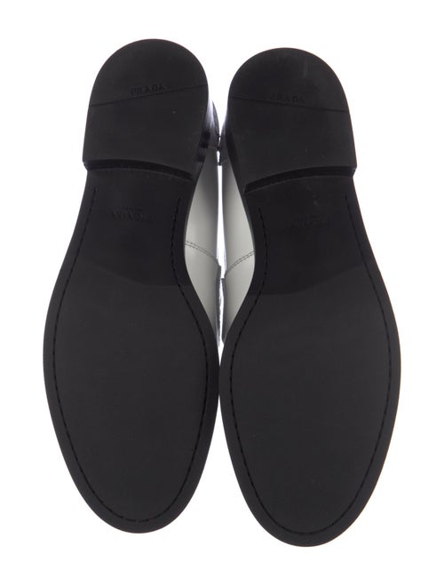 Prada Enameled Metal Triangle Leather Loafers