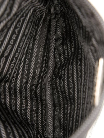 Prada Enameled Metal Triangle Belt Bag