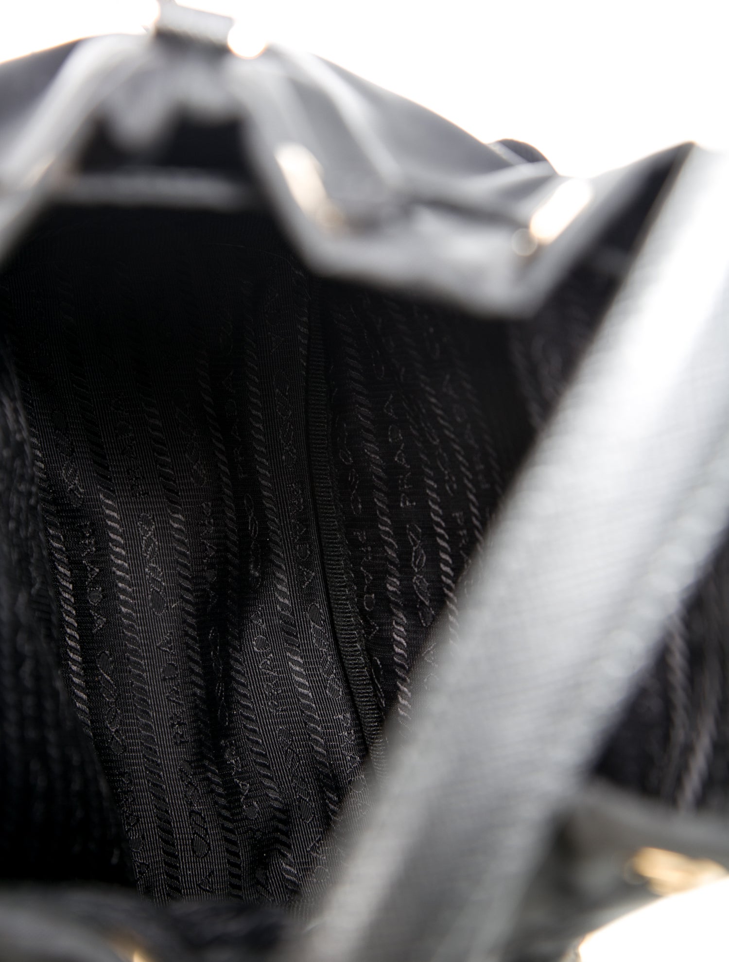 Prada Enameled Metal Triangle Bucket Bag