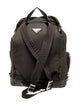 Prada Enameled Metal Triangle Backpack