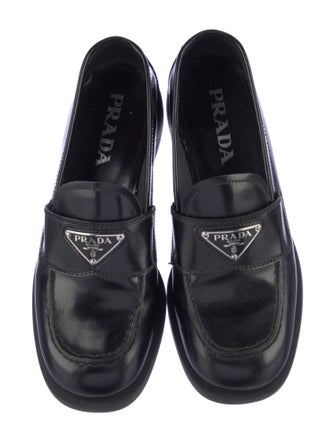 Prada Enameled Metal Triangle Leather Loafers