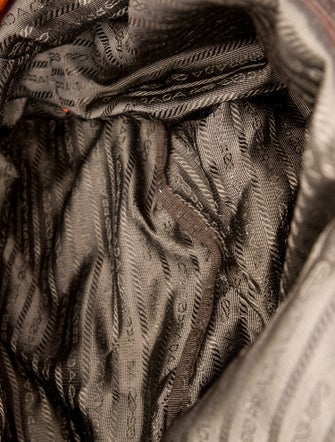 Prada Enameled Metal Triangle Backpack