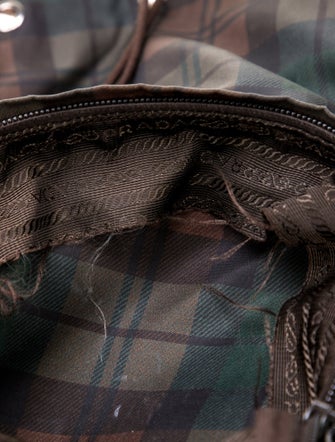 Prada Enameled Metal Triangle Backpack