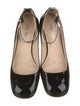 Prada Enameled Metal Triangle Patent Leather Pumps