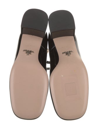 Prada Enameled Metal Triangle Patent Leather Pumps