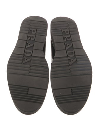 Prada Enameled Metal Triangle Leather Loafers