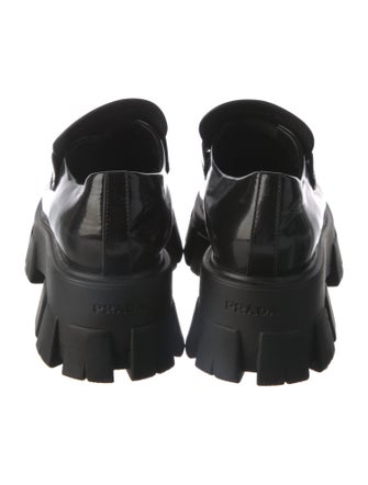 Prada Enameled Metal Triangle Patent Leather Loafers