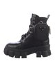 Prada Enameled Metal Triangle Leather Combat Boots