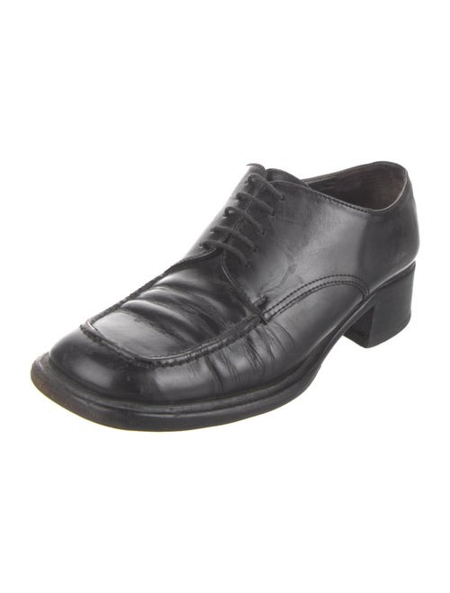 Prada Enameled Metal Triangle Leather Mules