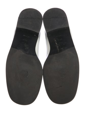 Prada Enameled Metal Triangle Patent Leather Loafers