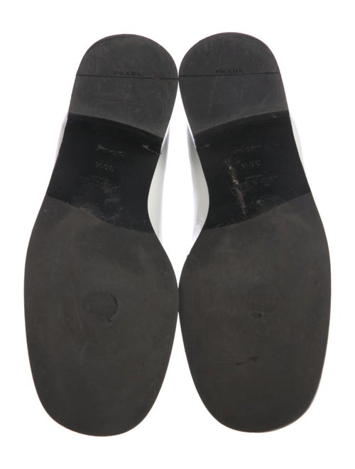 Prada Enameled Metal Triangle Patent Leather Loafers