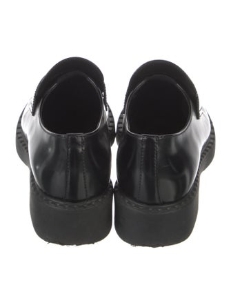 Prada Enameled Metal Triangle Leather Loafers