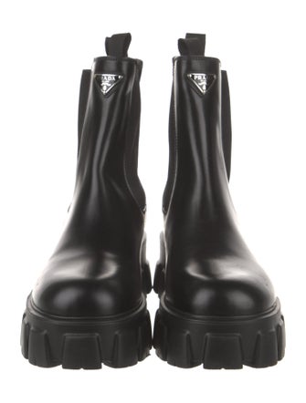 Prada Spazzolato Rois Monolith Enameled Metal Triangle Chelsea Boots
