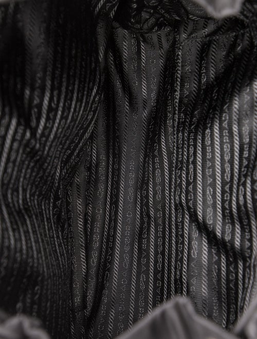 Prada Enameled Metal Triangle Backpack