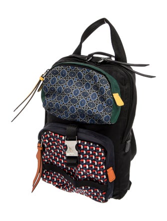 Prada Enameled Metal Triangle Backpack