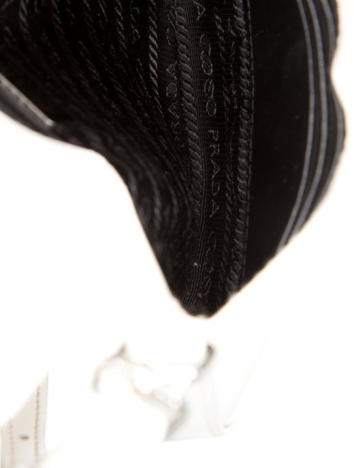 Prada Enameled Metal Triangle Cleo