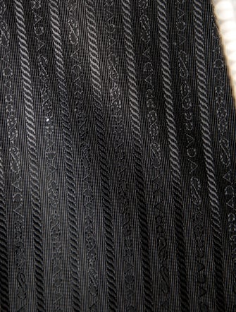 Prada Enameled Metal Triangle Sound