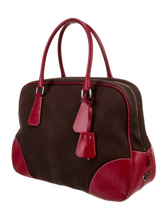 Prada Enameled Metal Triangle Canapa