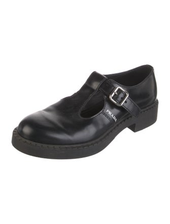 Prada Leather Cutout Accent Loafers