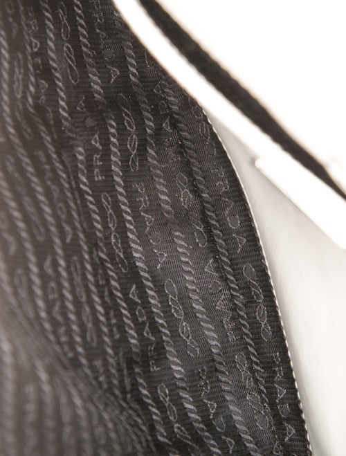 Prada Enameled Metal Triangle Cleo