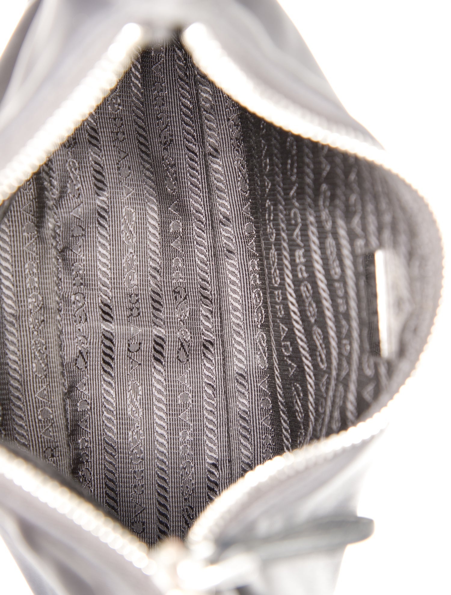 Prada Enameled Metal Triangle Re-Edition 2005