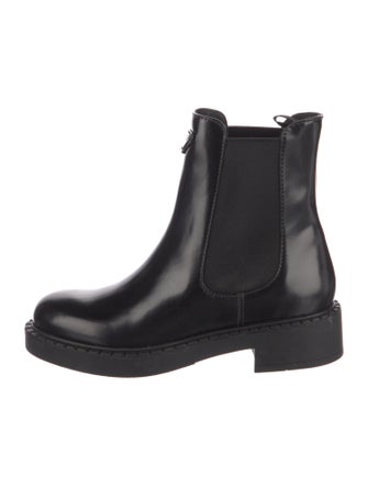 Prada Enameled Metal Triangle Patent Leather Chelsea Boots