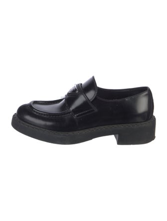 Prada Enameled Metal Triangle Leather Loafers