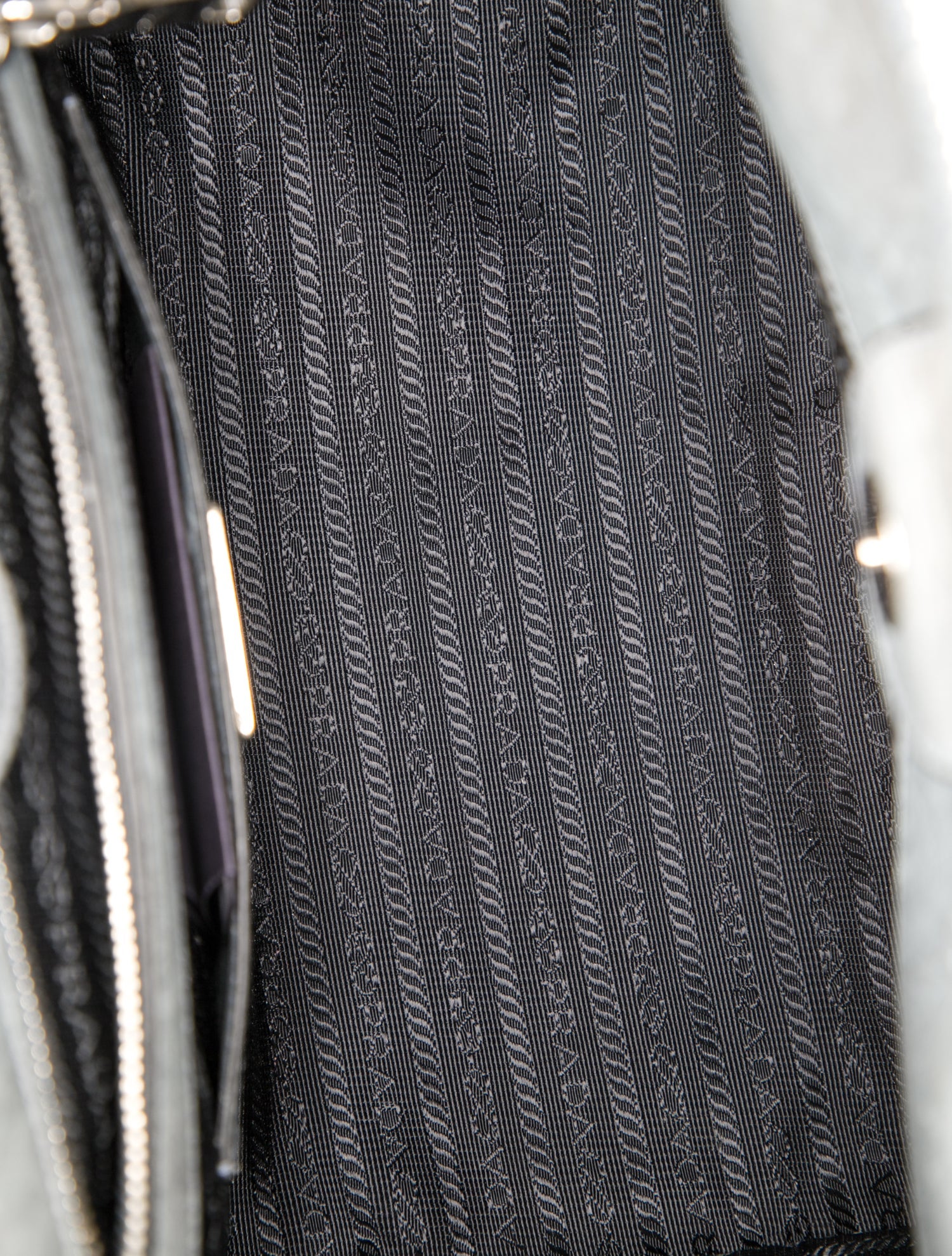 Prada Enameled Metal Triangle Twin Pocket