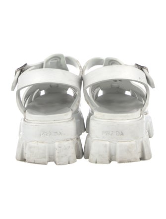 Prada Enameled Metal Triangle Rubber Gladiator Sandals