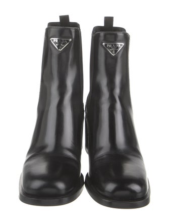 Prada Enameled Metal Triangle Leather Chelsea Boots