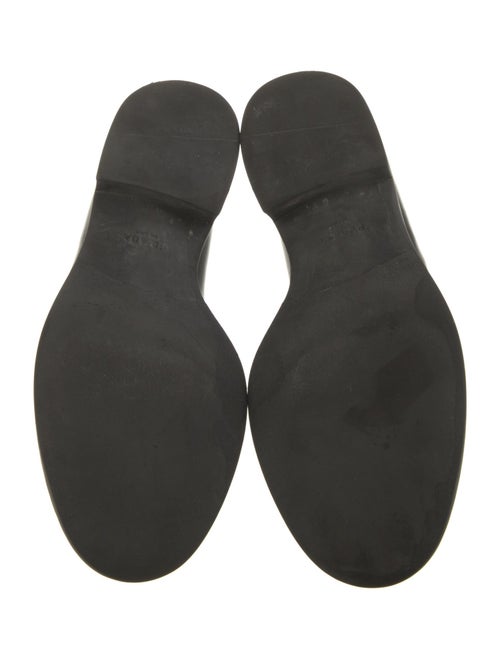 Prada Enameled Metal Triangle Leather Loafers