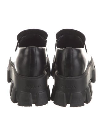 Prada Enameled Metal Triangle Leather Pumps