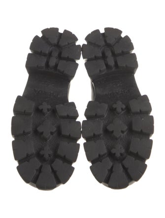 Prada Enameled Metal Triangle Leather Pumps