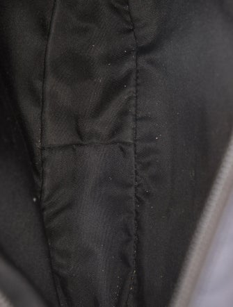 Prada Enameled Metal Triangle Belt Bag