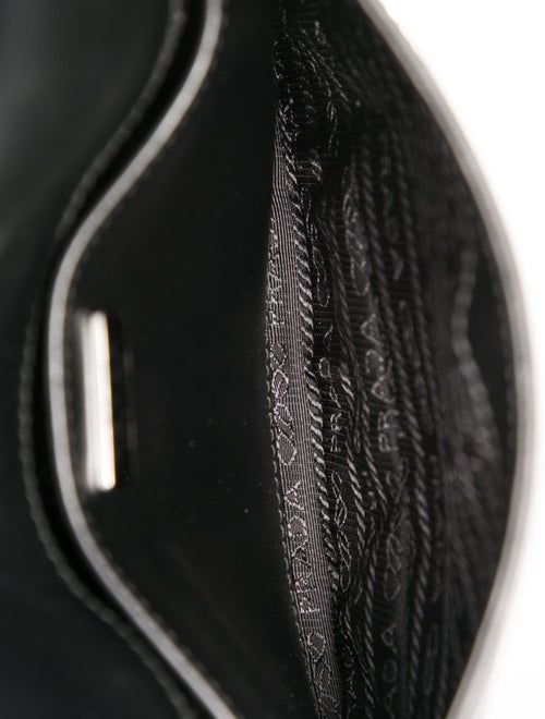 Prada Enameled Metal Triangle Cleo