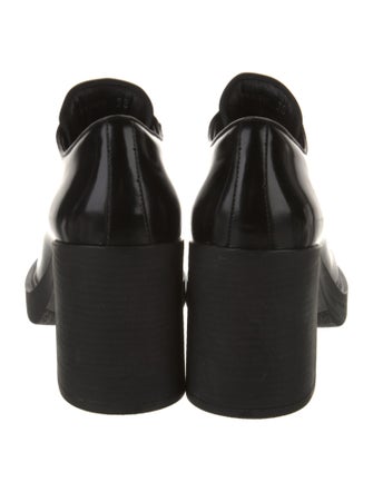 Prada Enameled Metal Triangle Patent Leather Pumps