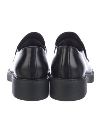 Prada Enameled Metal Triangle Leather Pumps