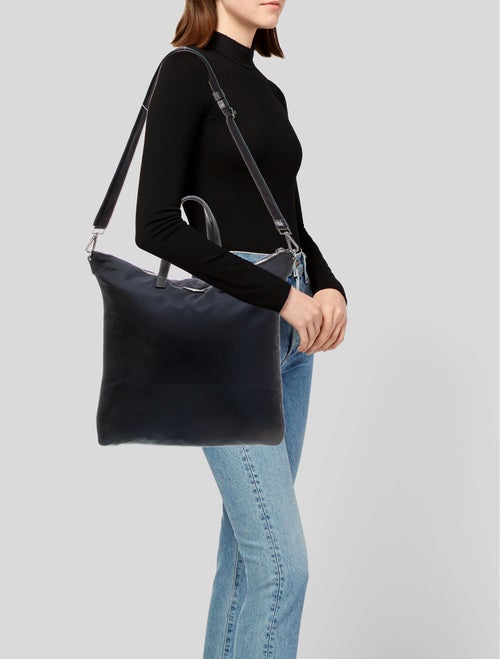 Prada Enameled Metal Triangle Belt Bag