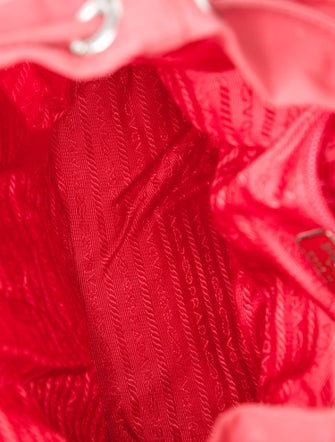 Prada Enameled Metal Triangle Backpack